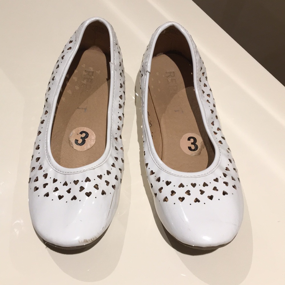 Report heart shaped slip ons